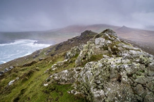 View from rocky hill overlooking coastline, looking from Waymont, Clogher Bay, Graigue, Dingle Peninsula, County Kerry