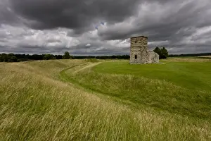 Site Prints: View of ruined Norman / Medieval church built within neolithic henge monument
