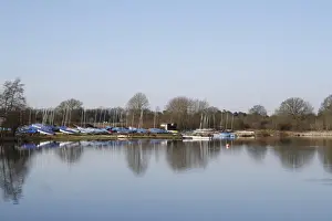 Gravel Prints: View of sailing boats at edge of flooded former gravel pit habitat