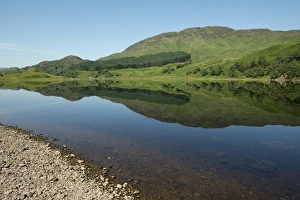 Lochs Prints: View of shore and hills reflected in freshwater loch