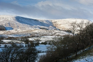 View of snow covered farmland and fell, looking towards Fair Oak Fell (left) Whitmore Fell (centre) and Totridge Fell from Long Knots, Whitewell, Lancashire, England, december