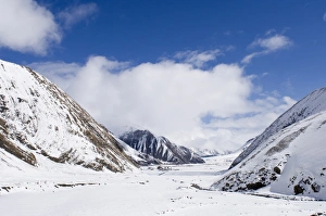Caucasus Prints: View along snow covered mountain valley