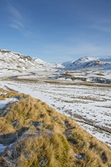 Clunie Water Prints: View of snow covered upland habitat with river