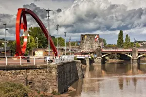 View of steel sculpture on waterfront with castle and bridge in background, The Wave, Newport Castle, Newport Bridge