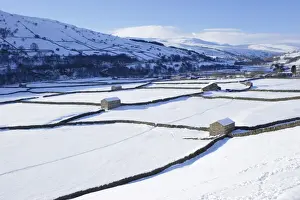 Dry Stone Prints: View of stone barns and drystone walls in snow covered valley bottom