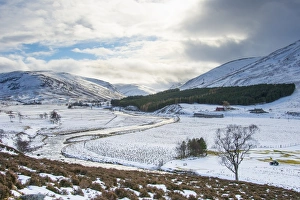 Cairngorms Prints: View of upland valley with river in snow