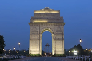 Subcontinent Prints: View of war memorial illuminated at night, India Gate, New Delhi, Delhi, India, March