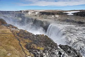 Subpolar Prints: View of waterfall flowing into canyon