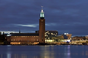 Light Prints: View of waterfront with city hall illuminated at night