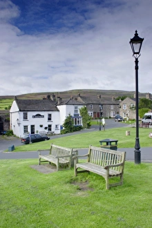 Trending: Village green with benches and lamppost