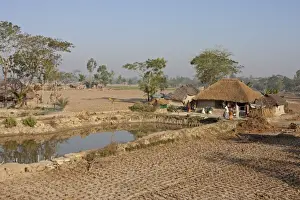 Subcontinent Prints: Village water storage pond, house and subsistence fields