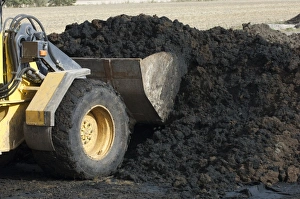 Muck Prints: Volvo L50 D wheel loader, loading muck into bucket, to load muck spreader, Sweden, autumn