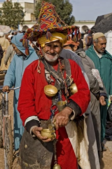 Moroccan Prints: Water vendor at market, near Essaouira, Morocco, february