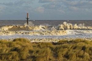 Defence Prints: Waves breaking on sea defences during North Sea tidal surge