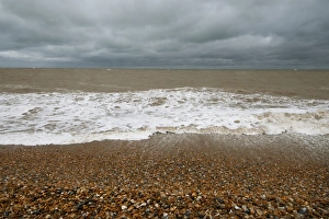 Choppy Prints: Waves crashing against shoreline of shingle beach, Dungeness, Kent, England, June