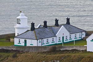 White painted lighthouse on coast, Anvil Point Lighthouse, Durlston, Isle of Purbeck, Dorset, England, january