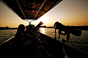 Holidays Prints: Wildlife photographers on boat