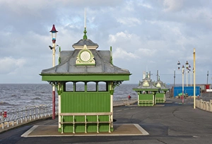 Resort Prints: Wind shelters beside sea in seaside resort town, Blackpool, Lancashire, England, january