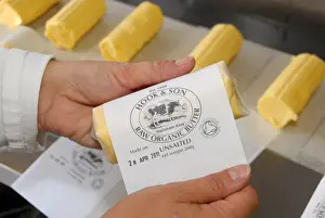 Jobs Prints: Worker labelling up organically made butter from unpasteurized milk